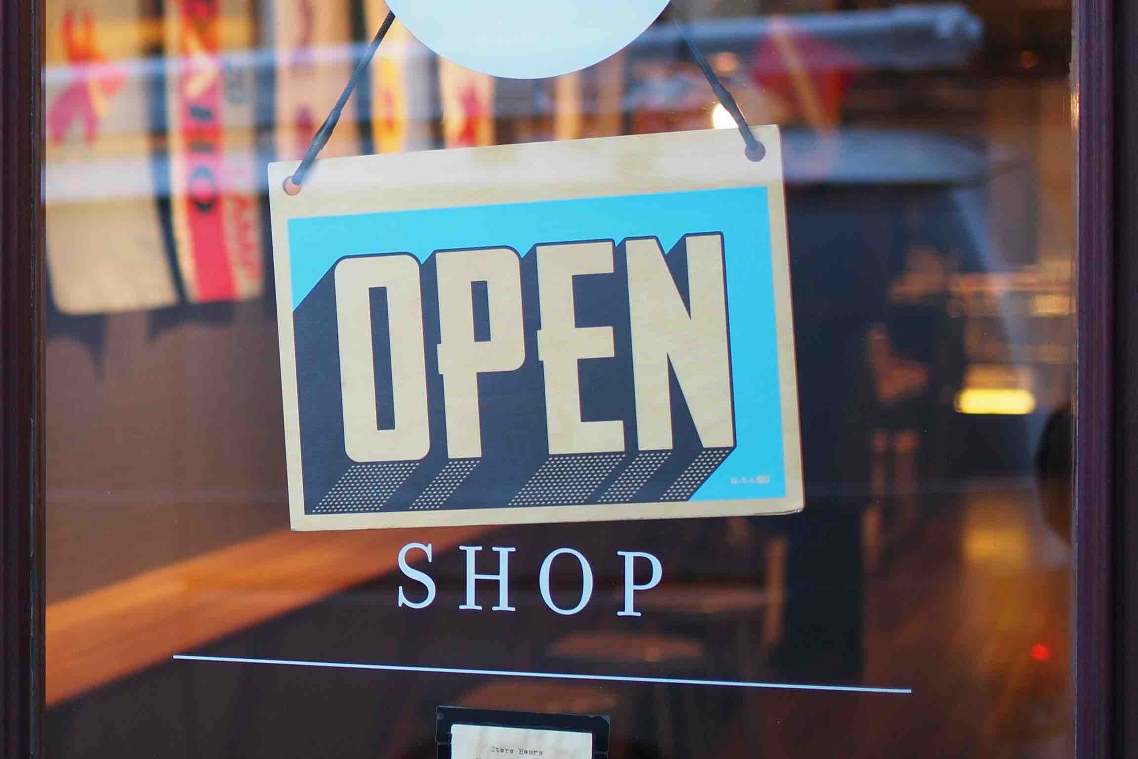 Open/closed sign on the shop door entrance
